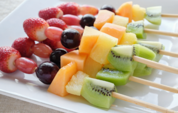 Plate of fresh fruit skewers