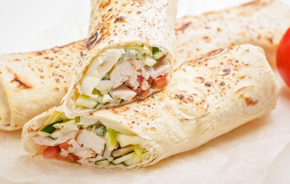 close-up of a grilled chicken wrap